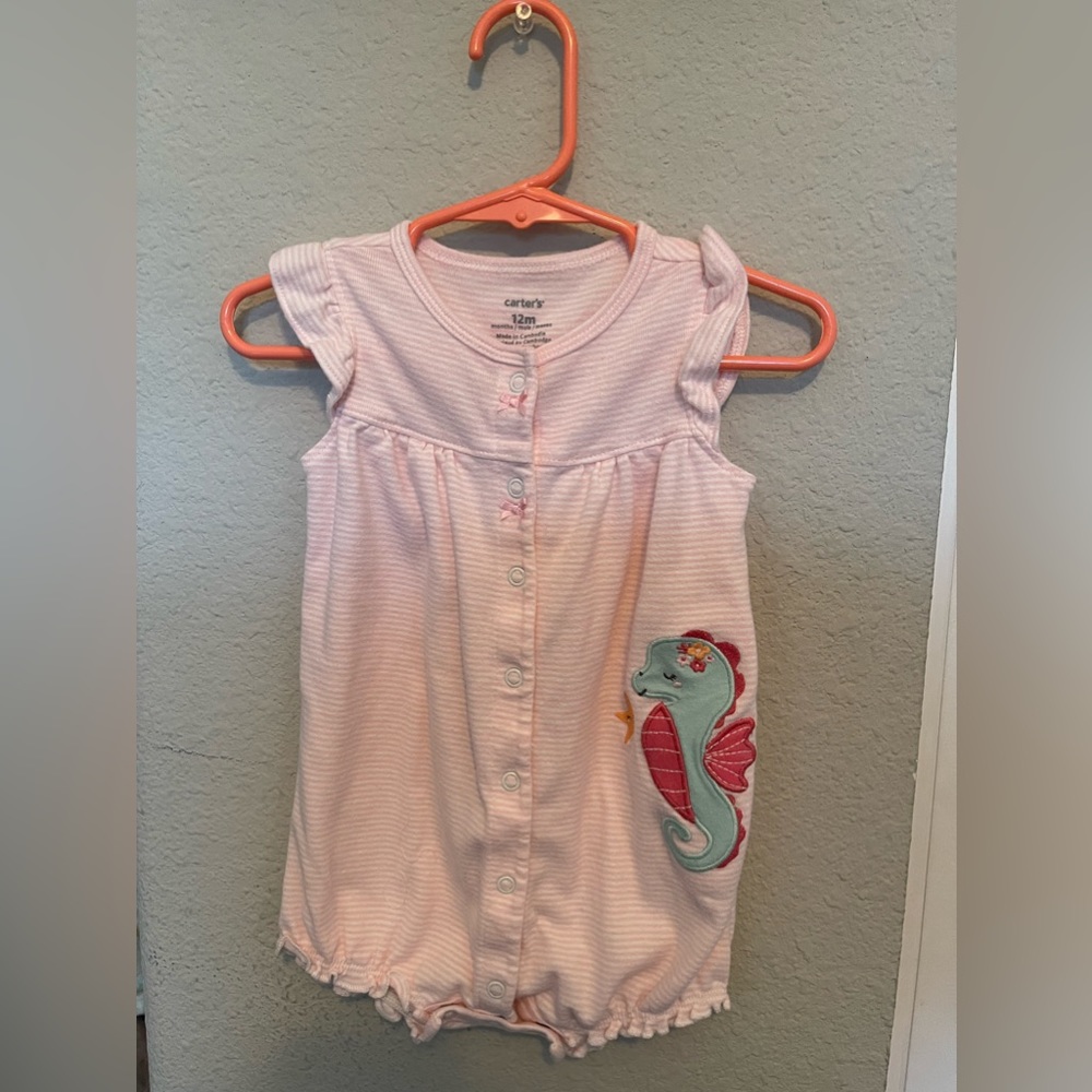 Pink seahorse romper.
